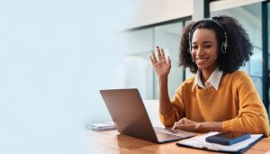 A remote professional using AI tools and project management software to manage business operations