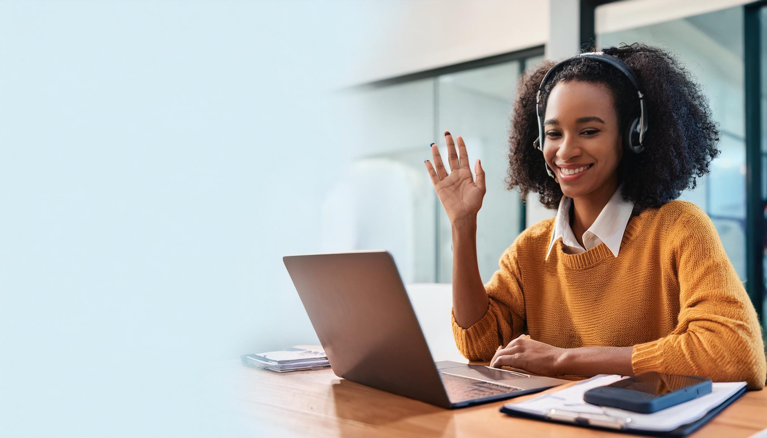 A remote professional using AI tools and project management software to manage business operations